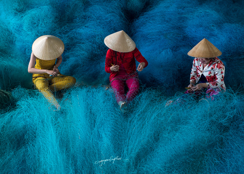 Vietnam Photo Tours - Iceland En Route - mending nets